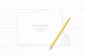 Flat lay top view elegant white composition yellow pencil and eraser on wooden background