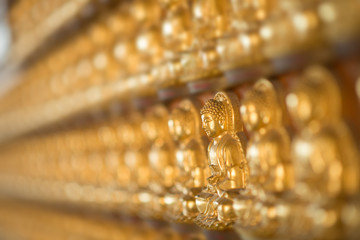 Small Buddha statue on the wall