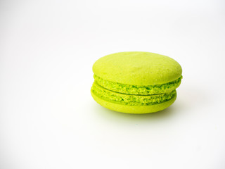 Sweet hazelnut Green macarons on white