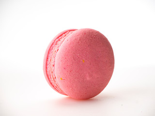 Pink macaroon on white background