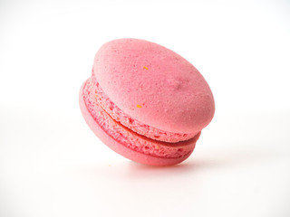 Pink macaroon on white background
