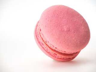 Pink macaroon on white background