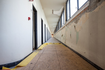 a long corridor in old building