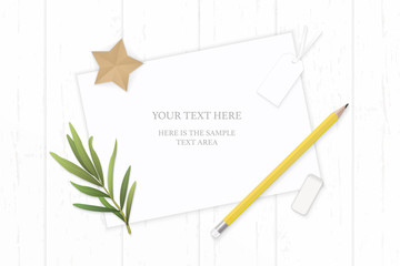 Flat lay top view elegant white composition paper tag yellow pencil eraeer star craft and tarragon leaf on wooden background
