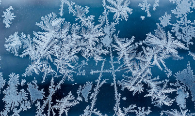 beautiful frosty patterns on glass