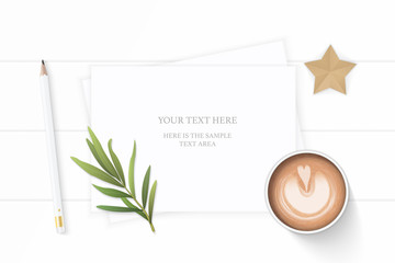 Flat lay top view elegant white composition paper pencil coffe tarragon leaf and star shape craft on wooden background