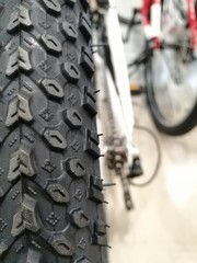 Selective focus of Bicycle wheel and tire. In Bicycle shop and repair.