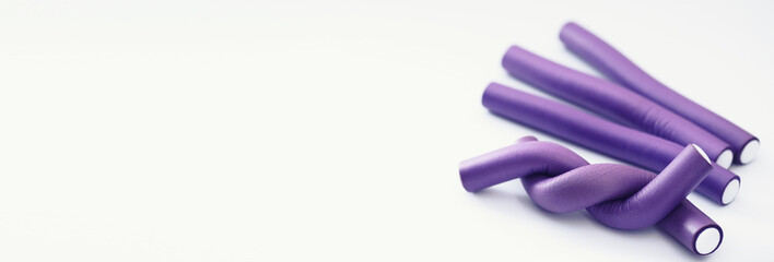 Female colored curlers and hair pins