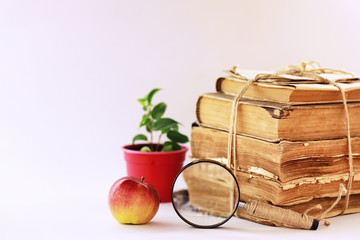 A stack of old vintage books