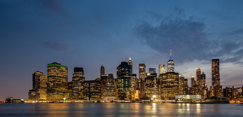 Fototapeta na wymiar Lower Manhattan Skyline at Dusk shot from Brooklyn Bridge Park