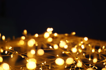 The golden LED light bokeh blurred abstract pattern background.