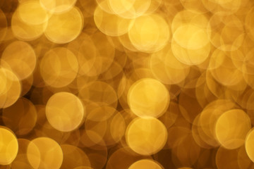The golden bokeh blurred abstract pattern background.