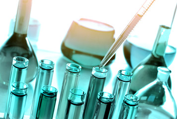 Laboratoy glassware with chemicals, chemistry science