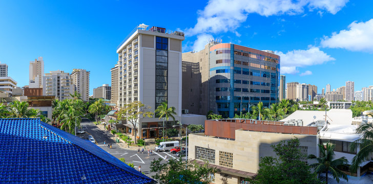 View Of Kalakaua Avenue Lined Up Famous Shopping District In Honolulu, Hawaii