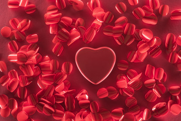 top view of red heart and beautiful decorative petals, valentines day background