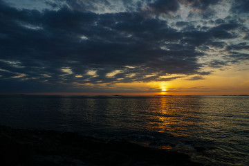 Fototapeta na wymiar Colorful beautiful sunset at Atlantic Ocean in Norway