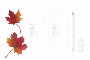 Flat lay top view elegant white composition paper pencil eraser and autumn maple leaf on wooden background