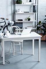 modern office design with white computer desk and rack