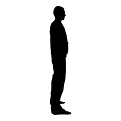 Man stands dressed in work clothes overalls and looks straight icon black color vector illustration flat style image