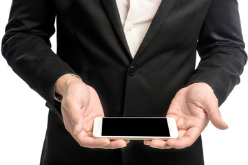 Businessman holding mobile phone on his hands