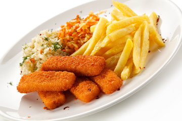Fried fish sticks with french fries on white background