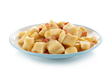 Potato noodles - dumplings on white background