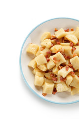 Potato noodles - dumplings on white background