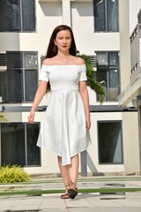 Unemotional Youthful Minority Adult Female Walking