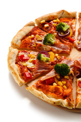Pizza with bacon and vegetables on cutting board on white background