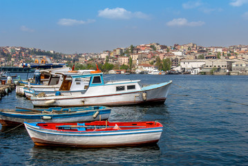 Fototapeta na wymiar Istanbul, Turkey, 21 April 2006: Boats at Balat, Halic