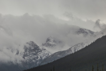 Overcast sky with Mountain view in the Canadian Rockies along the Icefields Parkway in Alberta, Canada.