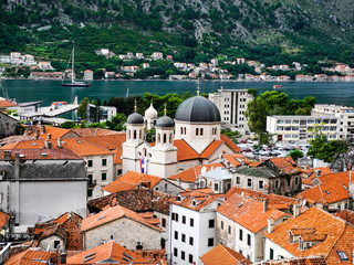 Obraz premium Kotor town, unesco heritage list. Montenegro. Beautiful panorama of orange roofs of medieval town.