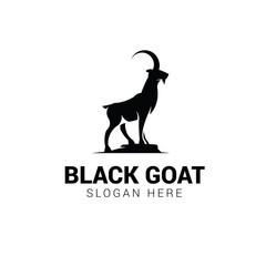 Goat standing on rock logo template