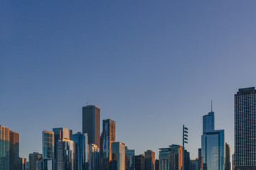 Skyline of downtown Chicago, USA at dusk viewed from Lake Michigan