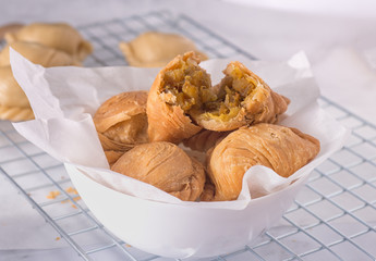 Curry puff pastry, snack curry puff, locally known as karipap