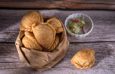 Curry puff pastry, snack curry puff, locally known as karipap