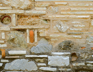 unusual random shapes stone wall closeup