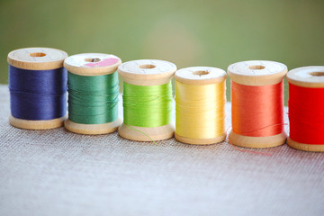 Antique Wooden Spools of Colorful Sewing Thread