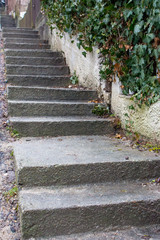 Outdoor stairs in perspective. Staircase background. Concrete stairway at town street. Pavement and walkway concept. Empty outside stairs. Stairs in park. Geometric pathway. 