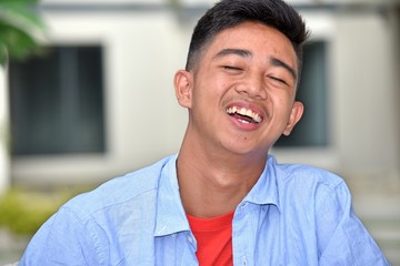 Teenager Boy And Laughter