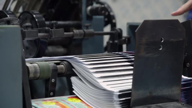 close up conveyor print house magazine press typography machine