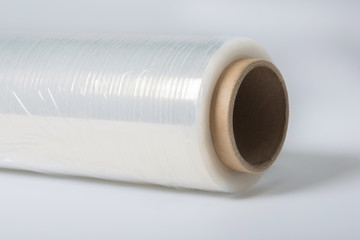 A roll of a clear polyethylene sheeting for packing. A close-up.