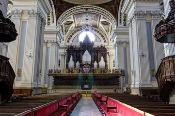 The main religious organ in the Pilar Cathedral, showing the note pipes and the wooden support, in Zaragoza, Aragon region, Spain