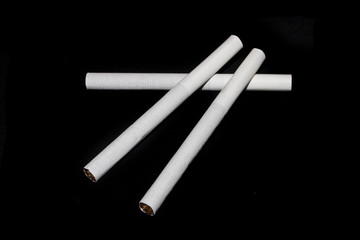 cigarette isolated on black background