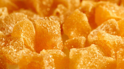 Crystallized candied ginger pieces close up