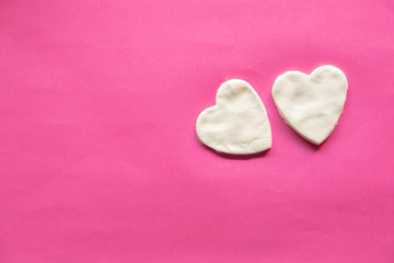 Fototapeta premium shape of heart, White heart on pink background, Love icon, valentine's day, relationships concept with copy space