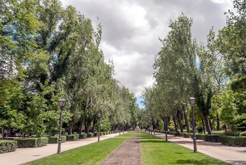 MADRID SPAIN - MAY 2014. Anonymous tourists walking through the retirement park in Madrid on a sunny day
