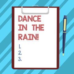 Text sign showing Dance In The Rain. Conceptual photo Enjoy the rainy day childish activities happy dancing Blank Sheet of Bond Paper on Clipboard with Click Ballpoint Pen Text Space