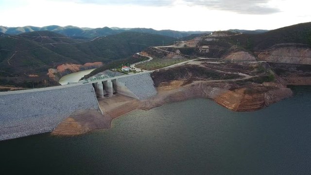 Aerial. Portuguese hydroelectro dam Odelouca, in mountains of Monchique. Algarve Portugal