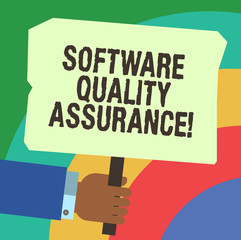 Handwriting text writing Software Quality Assurance. Concept meaning Ensuring quality in software engineering process Hu analysis Hand Holding Blank Colored Placard with Stick photo Text Space